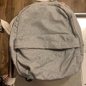 Miley Cyrus silver backpack
